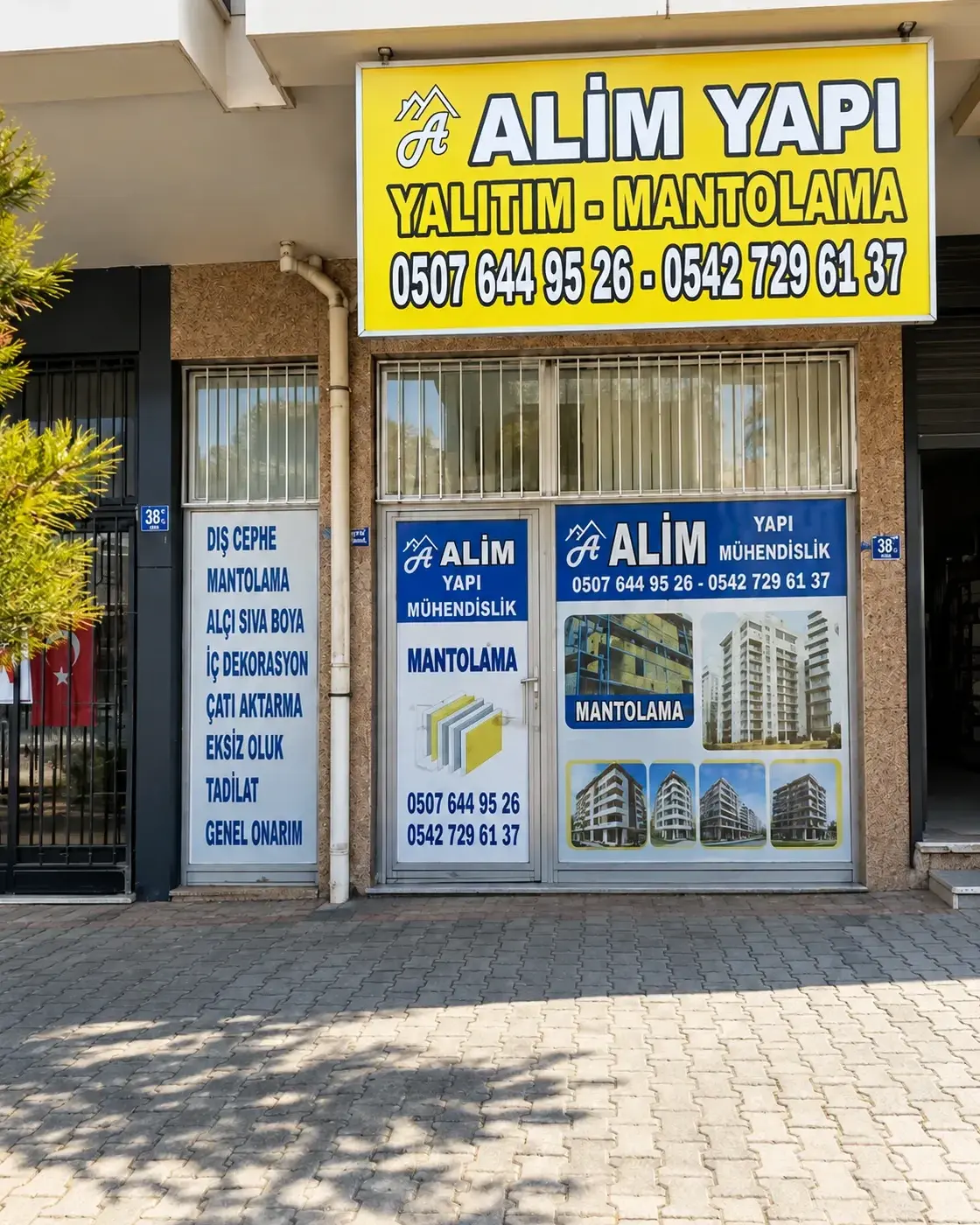 Alim Yapı'nın Keçiören'deki sarı tabelalı dükkânının girişi